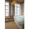 Panel winylowy Quick Step ze zintegrowanym podkładem Alpha Bloom elegancki dąb przydymiony AVMPU40317